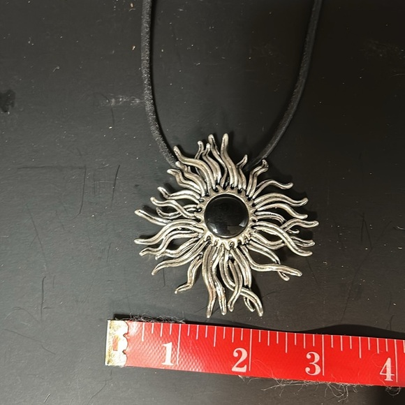 Silvertone sunburst necklace and earring set. Leather strap. - Picture 6 of 9